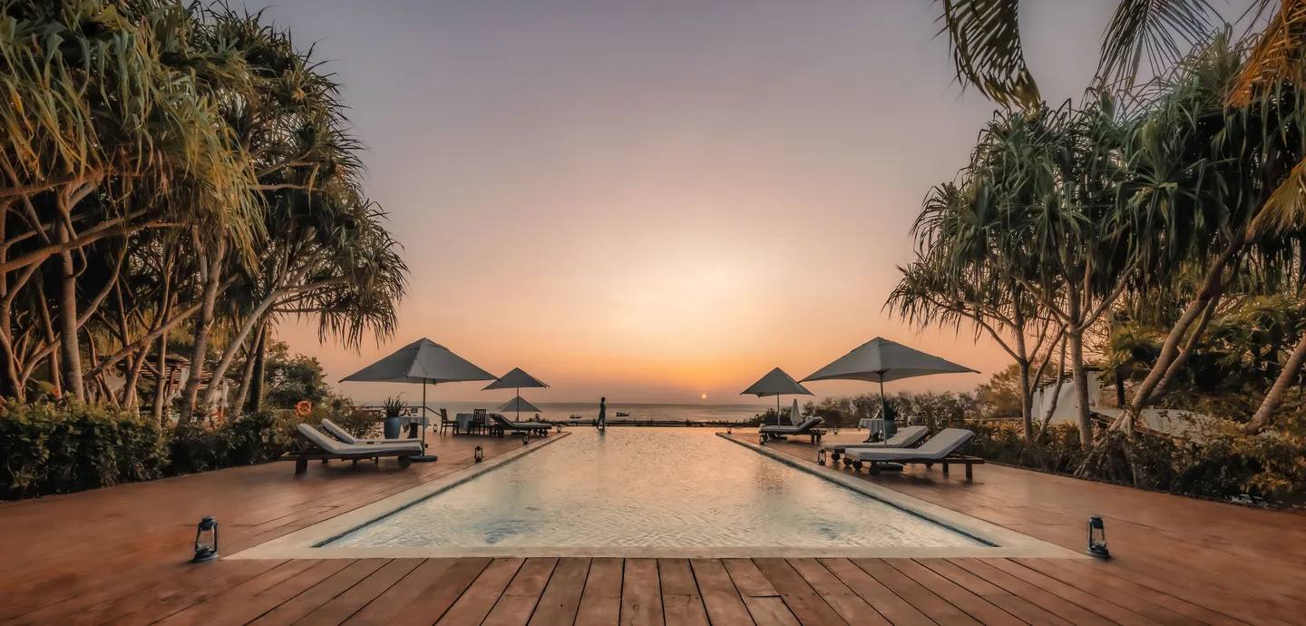 Sunset over the infinity pool at Kilindi Zanzibar, Kendwa